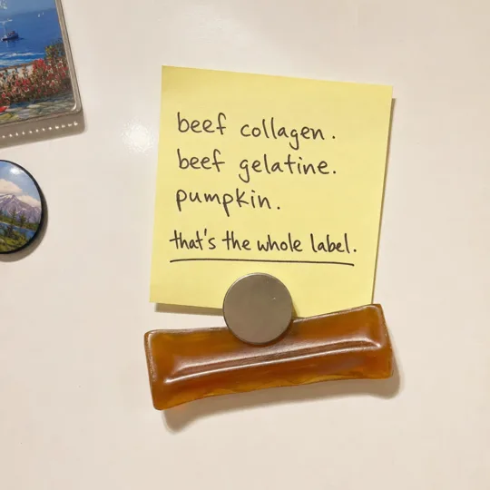Fangz ad: a handwritten sticky note listing the three ingredient label next to the chew